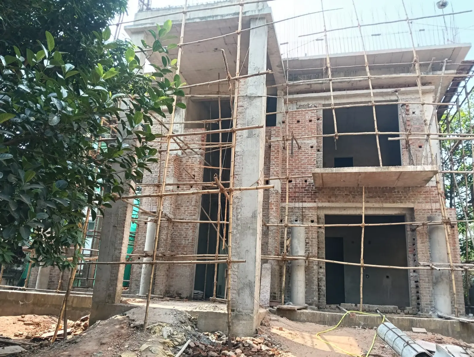 Building elevation under construction at a Paschima Infratech site